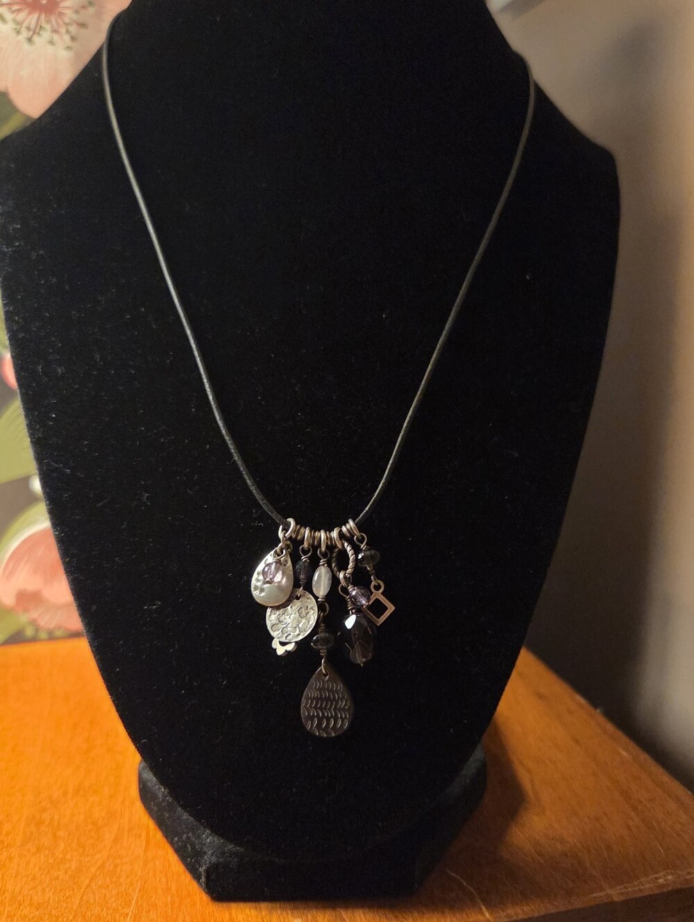 Retired Silpada 925, amethyst, glass, shell, and leather Charm Necklace